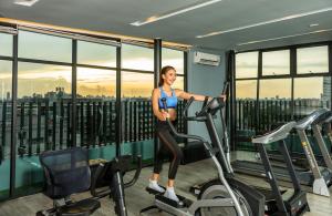 The fitness centre and/or fitness facilities at De Botan Srinakarin Hotel & Residence