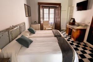 Krevet ili kreveti u jedinici u okviru objekta La Alberca de Fariñas