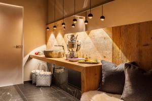 a kitchen with a counter with a mixer on it at Hotel Cristallino d'Ampezzo in Cortina dʼAmpezzo