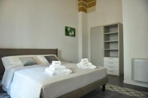 Cama o camas de una habitación en Tobacco Suite