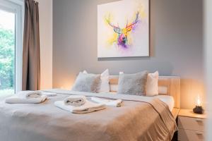 Postel nebo postele na pokoji v ubytování Residenz Seestern