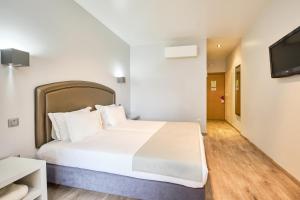 Letto o letti in una camera di Sintra Bliss Hotel