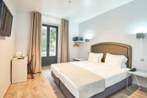 Letto o letti in una camera di Sintra Bliss Hotel