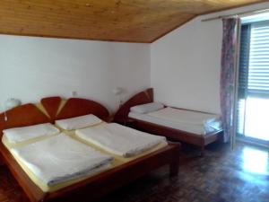 A bed or beds in a room at Guest Accommodation Palma