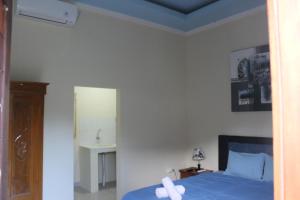 Postel nebo postele na pokoji v ubytování Ady Homestay
