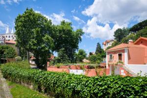 a village with a house and a hedge at Sintra Bliss A Part in Sintra