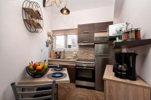 Kuchyň nebo kuchyňský kout v ubytování Casa Al Centro Di Corfu