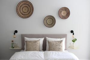 Uma cama ou camas num quarto em Hotel Paradis Zandvoort