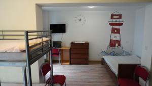 Llit o llits en una habitació de Hostel4u