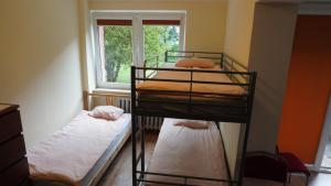 Llit o llits en una habitació de Hostel4u