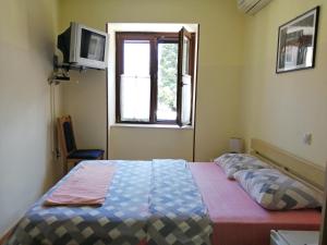 Postel nebo postele na pokoji v ubytování Hotel Pelikan