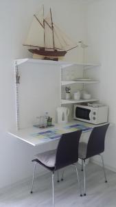 Kuchyň nebo kuchyňský kout v ubytování Chambre spacieuse, moderne et très confortable à Perros-Guirec