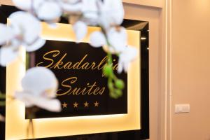 a sign for a star hotel in a room at Skadarlija Suites in Belgrade