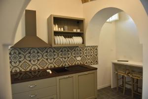 Una cocina o zona de cocina en Tobacco Suite