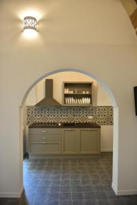 Una cocina o zona de cocina en Tobacco Suite