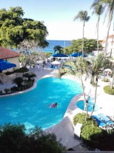 Utsikt över poolen vid Sosua by the Sea eller i närheten