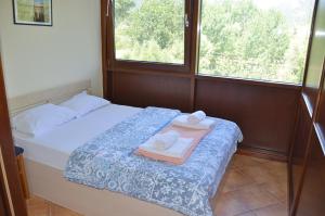 Postel nebo postele na pokoji v ubytování Hotel Pelikan