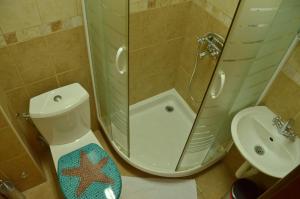 Koupelna v ubytování Hotel Pelikan