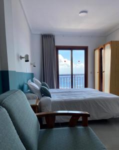 Postel nebo postele na pokoji v ubytování Hotel Castillete