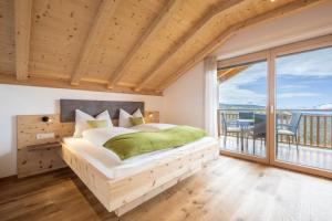 Posteľ alebo postele v izbe v ubytovaní Apartment Rosmarin - Kuenhof