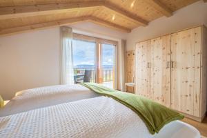 Posteľ alebo postele v izbe v ubytovaní Apartment Rosmarin - Kuenhof