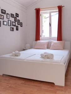 Postel nebo postele na pokoji v ubytování Apartment Iris