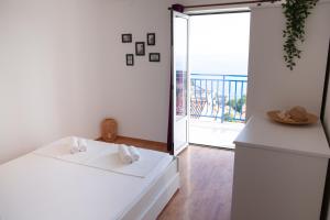 Postel nebo postele na pokoji v ubytování Apartment Iris