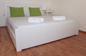 Postel nebo postele na pokoji v ubytování Apartment Iris