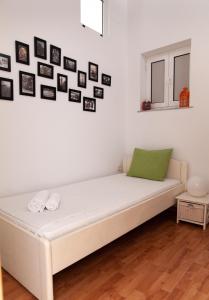 Postel nebo postele na pokoji v ubytování Apartment Iris