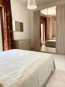 Posteľ alebo postele v izbe v ubytovaní Casa sul mare