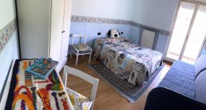 Postel nebo postele na pokoji v ubytování Wonderful Como Apartment