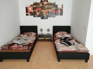 Un pat sau paturi într-o cameră la Apartment Paradies