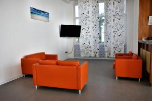 TV a/nebo společenská místnost v ubytování Hotel Internazionale