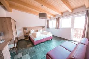 Postel nebo postele na pokoji v ubytování Haus Bergkastelblick