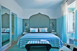Cama ou camas em um quarto em Bela Vista Hotel & Spa - Relais & Chateaux