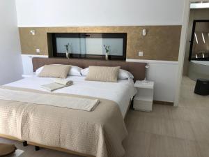 Posteľ alebo postele v izbe v ubytovaní Fuertevillage