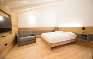 Posteľ alebo postele v izbe v ubytovaní Agritur Renetta