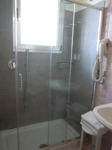 Koupelna v ubytování Hotel Regit