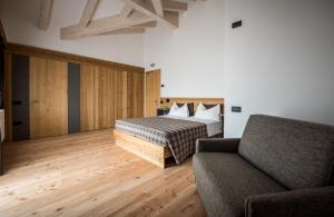 Posteľ alebo postele v izbe v ubytovaní Agritur Renetta