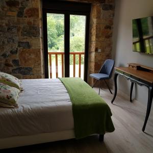 Postel nebo postele na pokoji v ubytování Posada las Albarcas