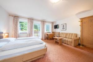 Postel nebo postele na pokoji v ubytování Ferienwohnung Innerwalten 100
