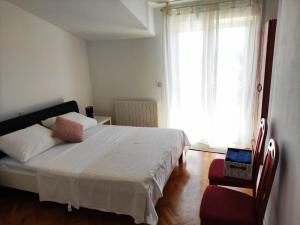 Posteľ alebo postele v izbe v ubytovaní Guesthouse Varnica