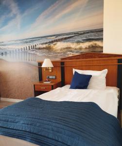 Postel nebo postele na pokoji v ubytování Hotel Novum