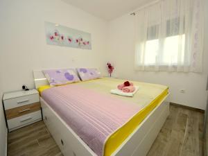 Postel nebo postele na pokoji v ubytování Apartment Marin by Interhome