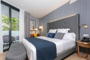 Posteľ alebo postele v izbe v ubytovaní Hotel Lima - Adults Recommended