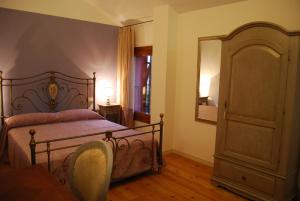 Postel nebo postele na pokoji v ubytování Agriturismo Colombera