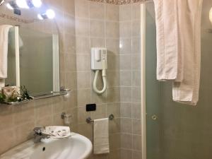 Koupelna v ubytování Hotel Kristall
