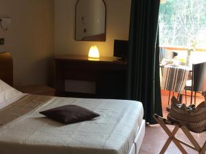 Postel nebo postele na pokoji v ubytování Hotel Kristall