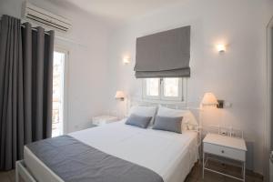 Postel nebo postele na pokoji v ubytování Villa Nireas