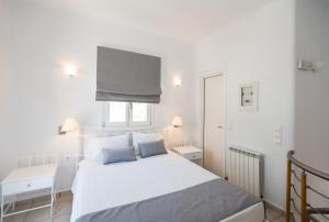 Postel nebo postele na pokoji v ubytování Villa Nireas